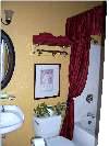 private bathroom with tub shower